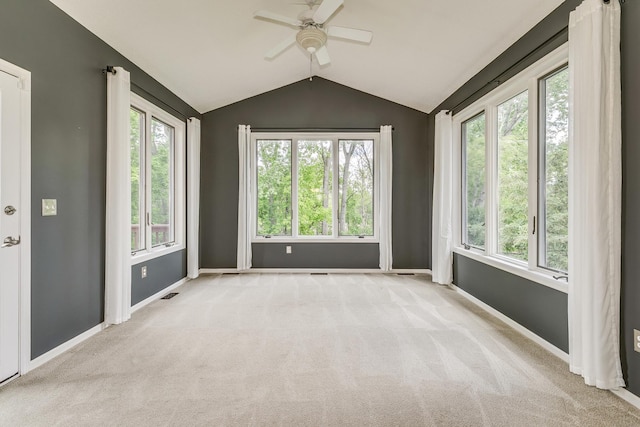 1469 Sherman Lake Rd, Lino Lakes, MN 55038 - unfurnished room featuring ceiling fan, vaulted ceiling, plenty of natural light, and carpet