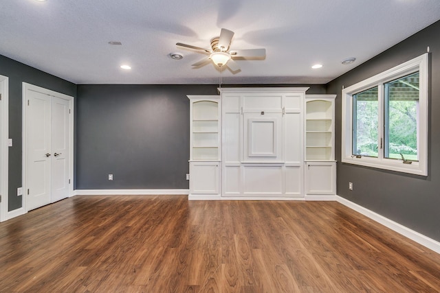1469 Sherman Lake Rd, Lino Lakes, MN 55038 - unfurnished bedroom with dark wood finished floors, baseboards, recessed lighting, and a ceiling fan