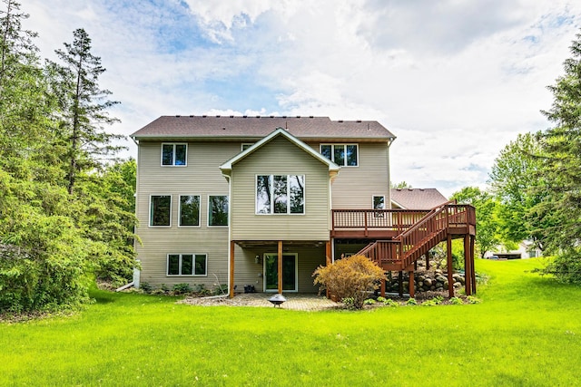 1469 Sherman Lake Rd, Lino Lakes, MN 55038 - rear view of house featuring a deck, a yard, and stairs
