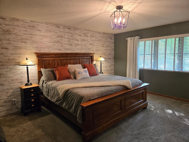 1410 16th St SW, Willmar, MN 56201 - bedroom with dark carpet, a chandelier, and a textured ceiling