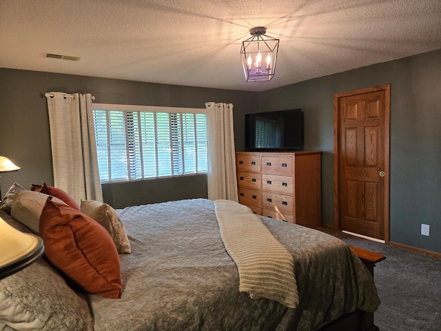 1410 16th St SW, Willmar, MN 56201 - bedroom with carpet flooring, a chandelier, and baseboards