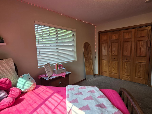 1410 16th St SW, Willmar, MN 56201 - bedroom featuring carpet floors and a closet