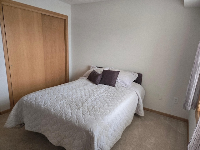 15631 Linnet St NW Unit 3-208, Andover, MN 55304 - bedroom with carpet floors, baseboards, and a closet