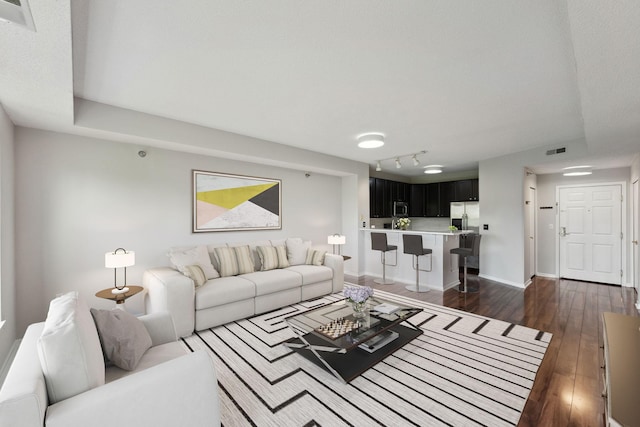 615 1st St Unit 405, Minneapolis, MN 55401 - living room with dark wood-style flooring and baseboards