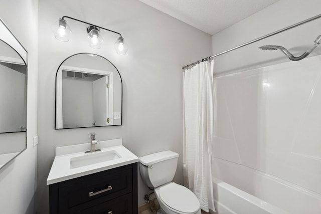 615 1st St Unit 405, Minneapolis, MN 55401 - full bath with toilet, vanity, shower / bath combination with curtain, and a textured ceiling