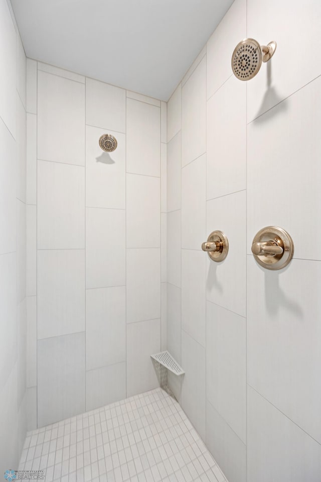 4295 Bristlecone Loop S, Fargo, ND 58104 - full bathroom featuring tiled shower