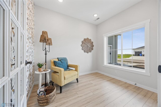 4295 Bristlecone Loop S, Fargo, ND 58104 - living area featuring baseboards, wood finished floors, and recessed lighting