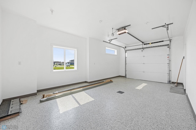 4295 Bristlecone Loop S, Fargo, ND 58104 - garage with a garage door opener and baseboards