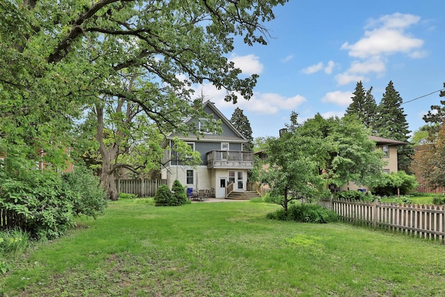 1807 Minnehaha Ave W, Saint Paul, MN 55104 - back of property featuring a balcony and a patio