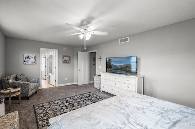 7243 Ada Dr, Lino Lakes, MN 55038 - carpeted bedroom with baseboards, a ceiling fan, and ensuite bath