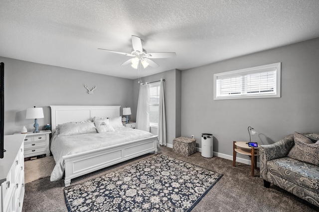 7243 Ada Dr, Lino Lakes, MN 55038 - carpeted bedroom with a ceiling fan, a textured ceiling, and baseboards