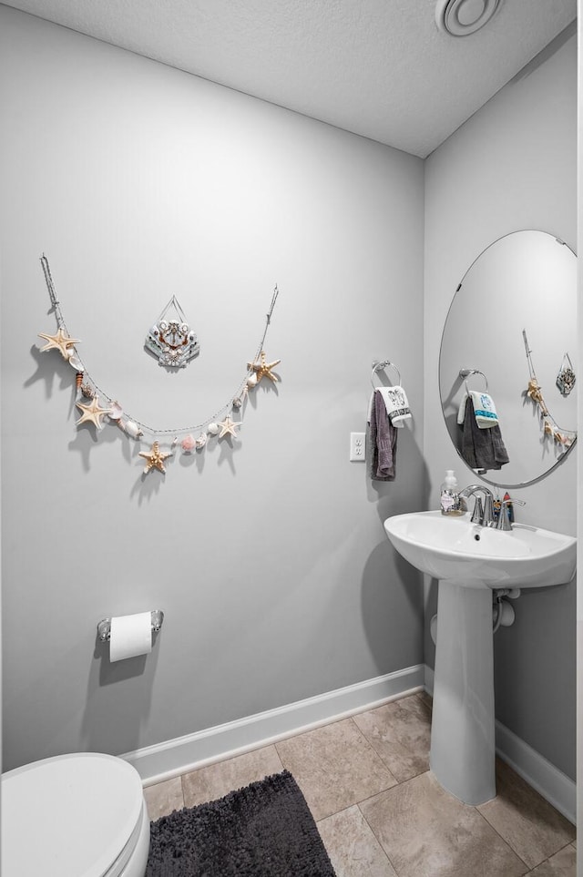 7243 Ada Dr, Lino Lakes, MN 55038 - bathroom with toilet and baseboards