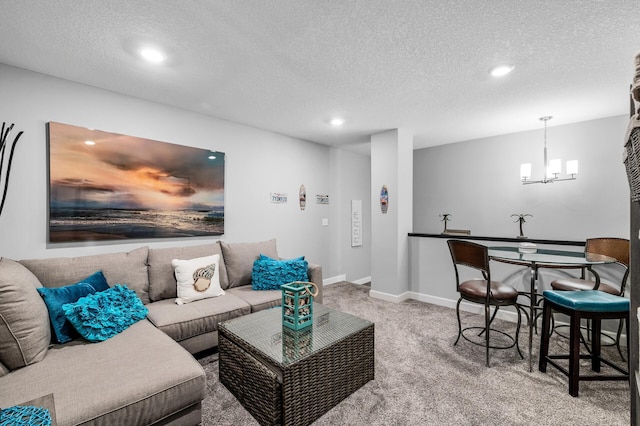 7243 Ada Dr, Lino Lakes, MN 55038 - living room with carpet flooring, a chandelier, a textured ceiling, recessed lighting, and baseboards