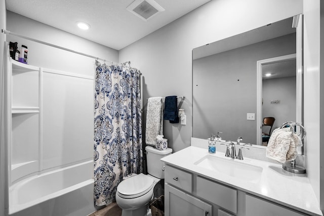 7243 Ada Dr, Lino Lakes, MN 55038 - full bathroom with shower / bath combo, vanity, toilet, and recessed lighting