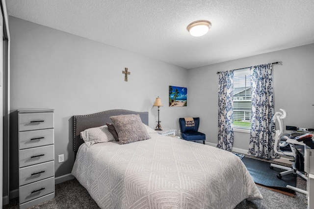 7243 Ada Dr, Lino Lakes, MN 55038 - bedroom featuring a textured ceiling, baseboards, and carpet floors