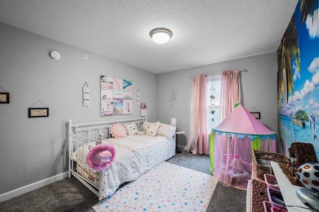 7243 Ada Dr, Lino Lakes, MN 55038 - carpeted bedroom featuring a textured ceiling and baseboards