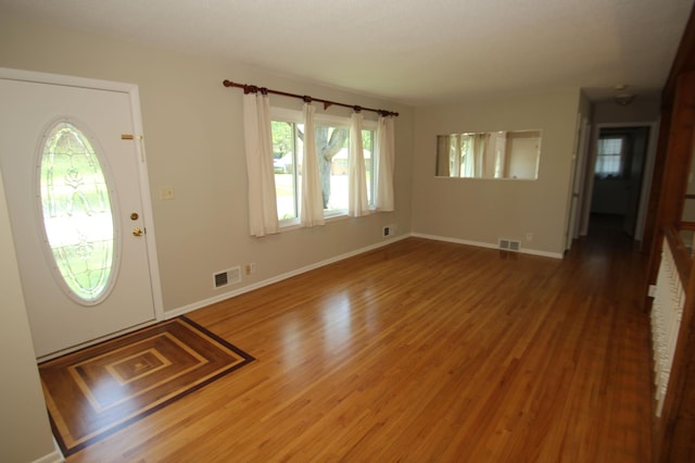 3249 Zane Ave N, Crystal, MN 55422 - foyer entrance with wood finished floors and baseboards