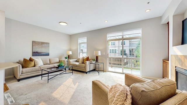 8102 Oakview Ln N Unit 39, Maple Grove, MN 55369 - living room featuring light carpet, a fireplace, recessed lighting, and baseboards