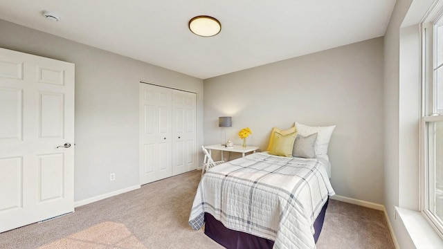 8102 Oakview Ln N Unit 39, Maple Grove, MN 55369 - bedroom featuring carpet flooring, baseboards, and a closet