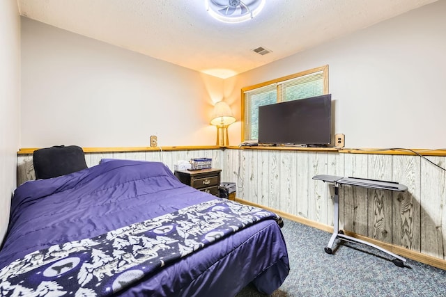 14890 Country Rd, Rogers, MN 55374 - carpeted bedroom with baseboards and wooden walls