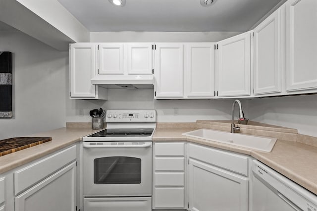2220 Ridge Dr Unit 16, Saint Louis Park, MN 55416 - kitchen with white appliances, under cabinet range hood, white cabinetry, and light countertops