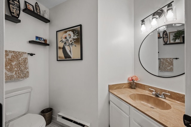 2220 Ridge Dr Unit 16, Saint Louis Park, MN 55416 - half bath featuring baseboard heating, vanity, and tile patterned floors