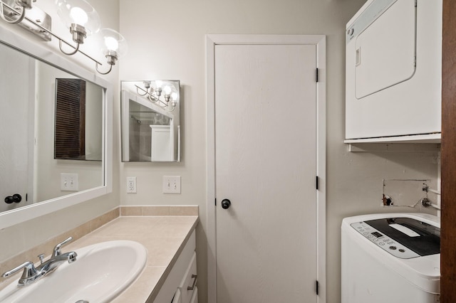 2220 Ridge Dr Unit 16, Saint Louis Park, MN 55416 - bathroom with vanity and estacked washer and dryer