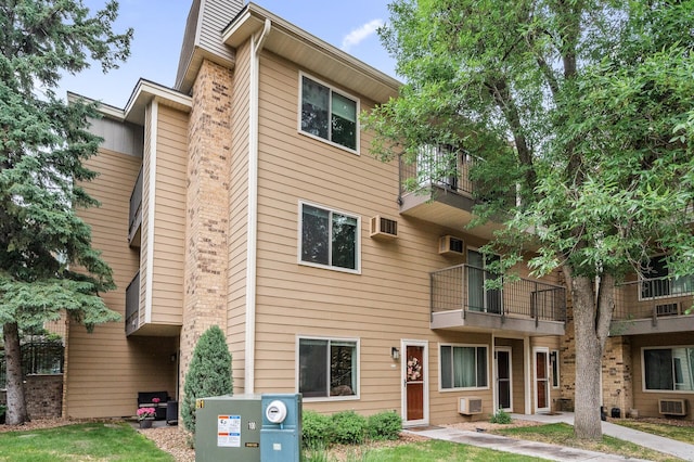 2220 Ridge Dr Unit 16, Saint Louis Park, MN 55416 - view of building exterior featuring a wall unit AC