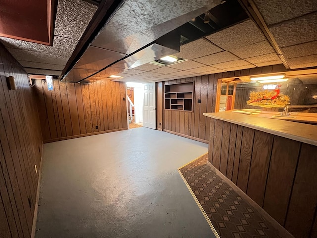 2619 2nd Ave W, Hibbing, MN 55746 - finished below grade area featuring wood walls, stairway, and a dry bar