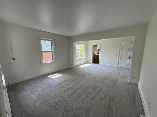 2619 2nd Ave W, Hibbing, MN 55746 - carpeted spare room with baseboards