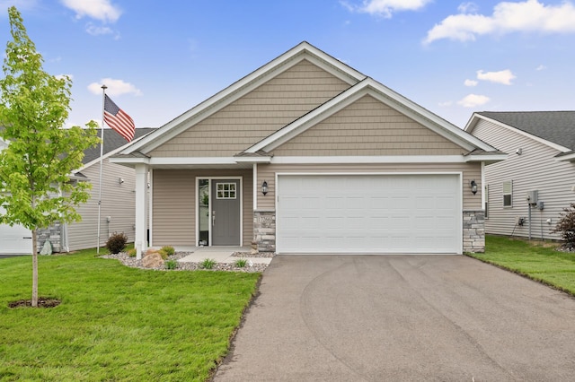 17266 204th Ave NW, Big Lake, MN 55309 - craftsman-style home with stone siding, a front lawn, and driveway