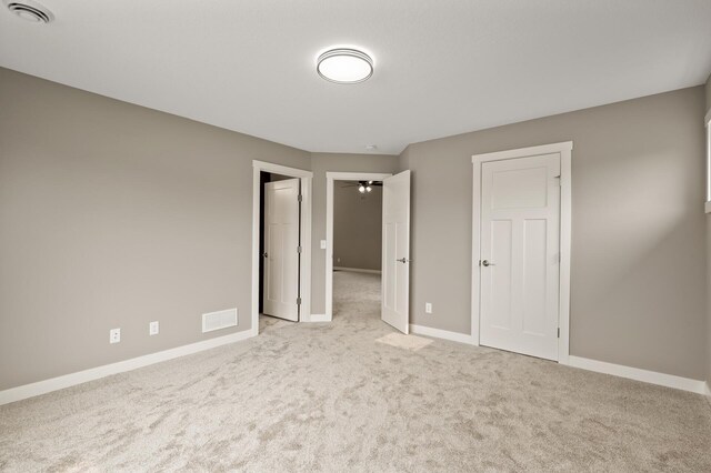 17266 204th Ave NW, Big Lake, MN 55309 - unfurnished bedroom featuring carpet floors and baseboards