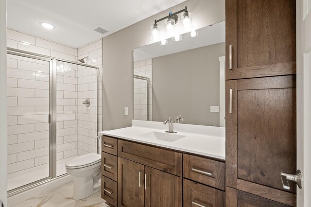 17266 204th Ave NW, Big Lake, MN 55309 - full bathroom featuring toilet, vanity, a stall shower, and marble look tiles