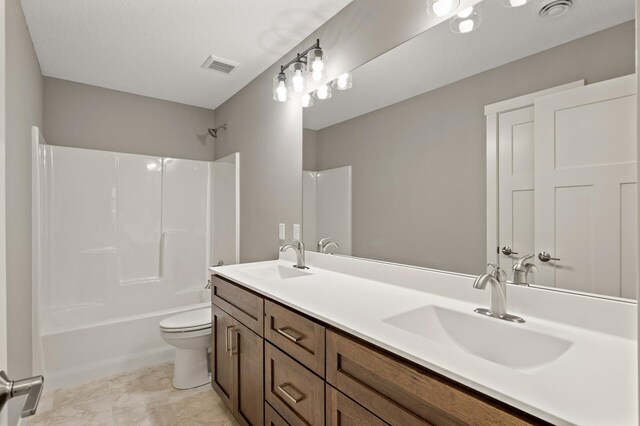 17266 204th Ave NW, Big Lake, MN 55309 - full bathroom featuring toilet, double vanity, and  shower combination
