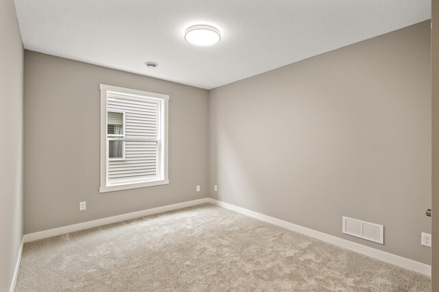 17266 204th Ave NW, Big Lake, MN 55309 - carpeted spare room with baseboards and a smoke detector