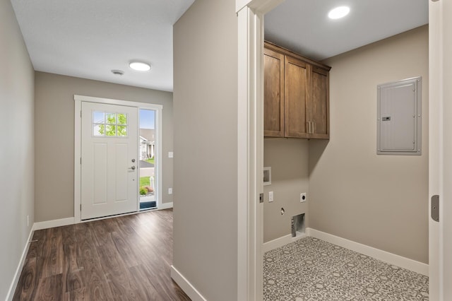 17266 204th Ave NW, Big Lake, MN 55309 - washroom featuring electric panel, electric dryer hookup, cabinet space, baseboards, and recessed lighting