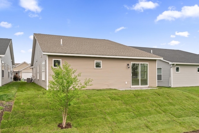 17266 204th Ave NW, Big Lake, MN 55309 - back of house with central AC and a lawn