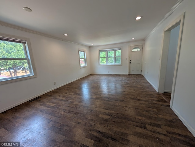353 44th Ave NW, Powers Twp, MN 56435 - empty room with ornamental molding, dark wood-style flooring, recessed lighting, and baseboards