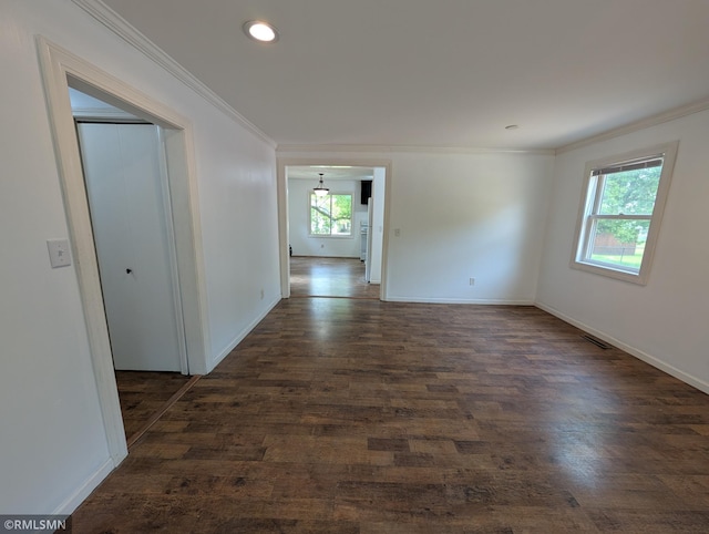 353 44th Ave NW, Powers Twp, MN 56435 - spare room featuring ornamental molding, dark wood-style flooring, baseboards, and recessed lighting