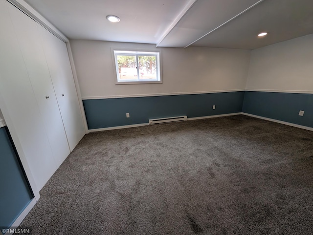 353 44th Ave NW, Powers Twp, MN 56435 - unfurnished bedroom with a baseboard heating unit, carpet flooring, baseboards, and recessed lighting