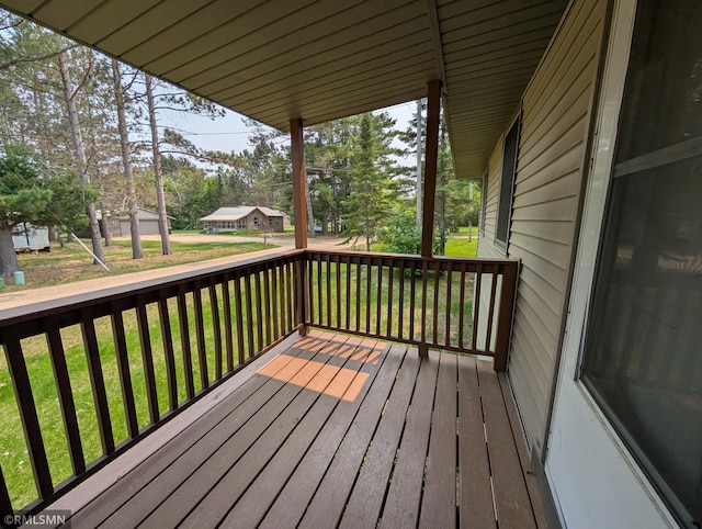 353 44th Ave NW, Powers Twp, MN 56435 - deck with a lawn