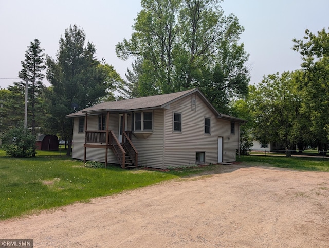 353 44th Ave NW, Powers Twp, MN 56435 - view of front of home with a front yard, stairs, and covered porch