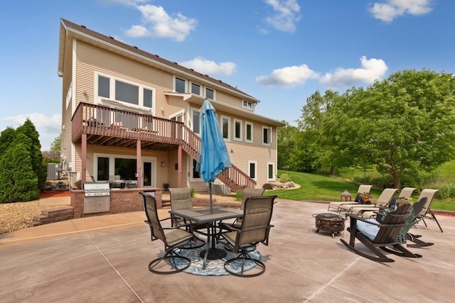 1900 Legacy Dr, Faribault, MN 55021 - view of patio / terrace with an outdoor fire pit, stairs, a deck, and outdoor dining area
