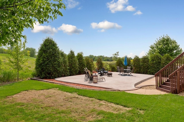 1900 Legacy Dr, Faribault, MN 55021 - view of patio / terrace with stairs and a fire pit