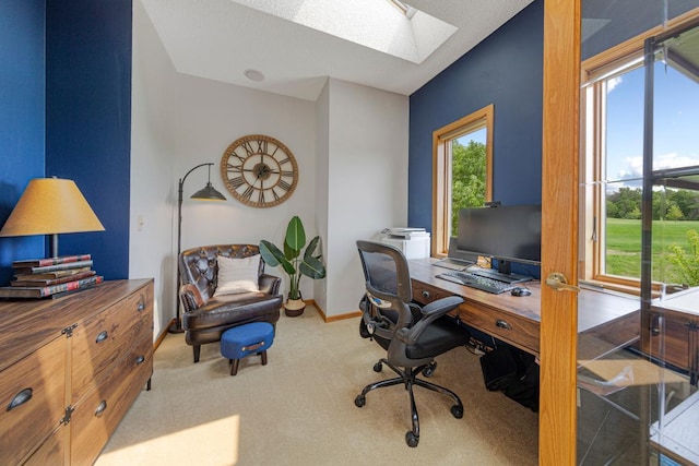 1900 Legacy Dr, Faribault, MN 55021 - office area featuring a skylight, plenty of natural light, carpet floors, and baseboards
