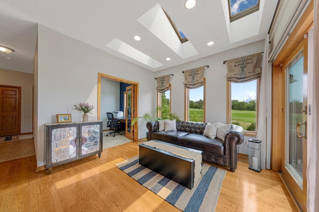 1900 Legacy Dr, Faribault, MN 55021 - living room with a skylight, light wood finished floors, a desk, recessed lighting, and baseboards