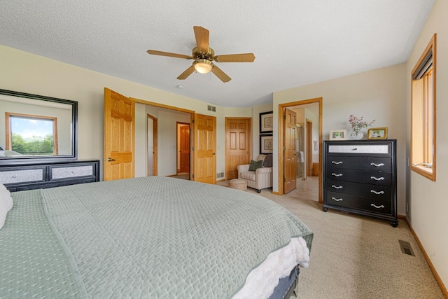 1900 Legacy Dr, Faribault, MN 55021 - bedroom featuring light carpet, baseboards, and ceiling fan
