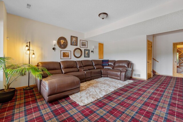 1900 Legacy Dr, Faribault, MN 55021 - living room with carpet floors, stairs, and a textured ceiling