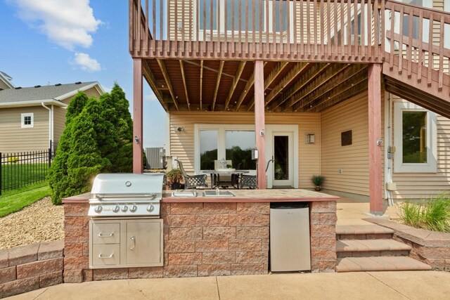 1900 Legacy Dr, Faribault, MN 55021 - view of patio / terrace with a deck