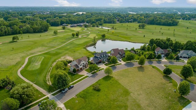 1900 Legacy Dr, Faribault, MN 55021 - drone / aerial view of a nearby body of water, a golf club, and a tree filled landscape